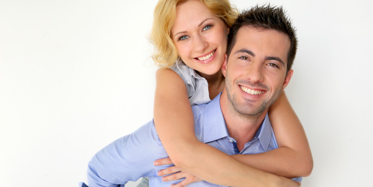 Smiling Young Couple White Background