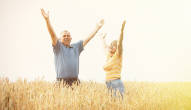 Old people over field background