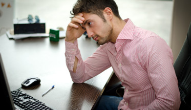 Stressed Man at Computer