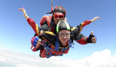 guy and girl sky diving