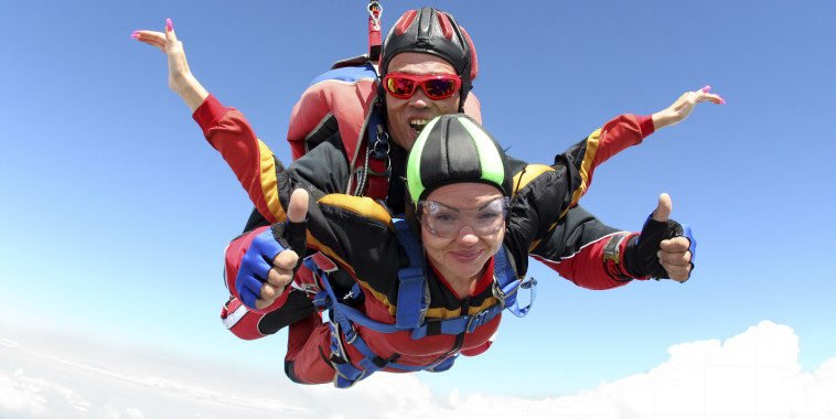 guy and girl sky diving