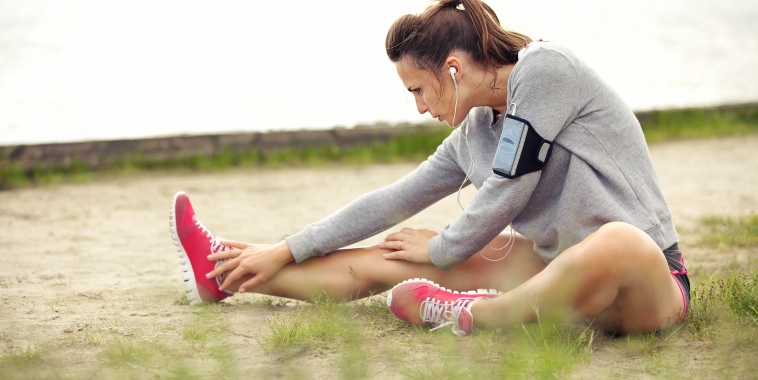 woman stretching outside